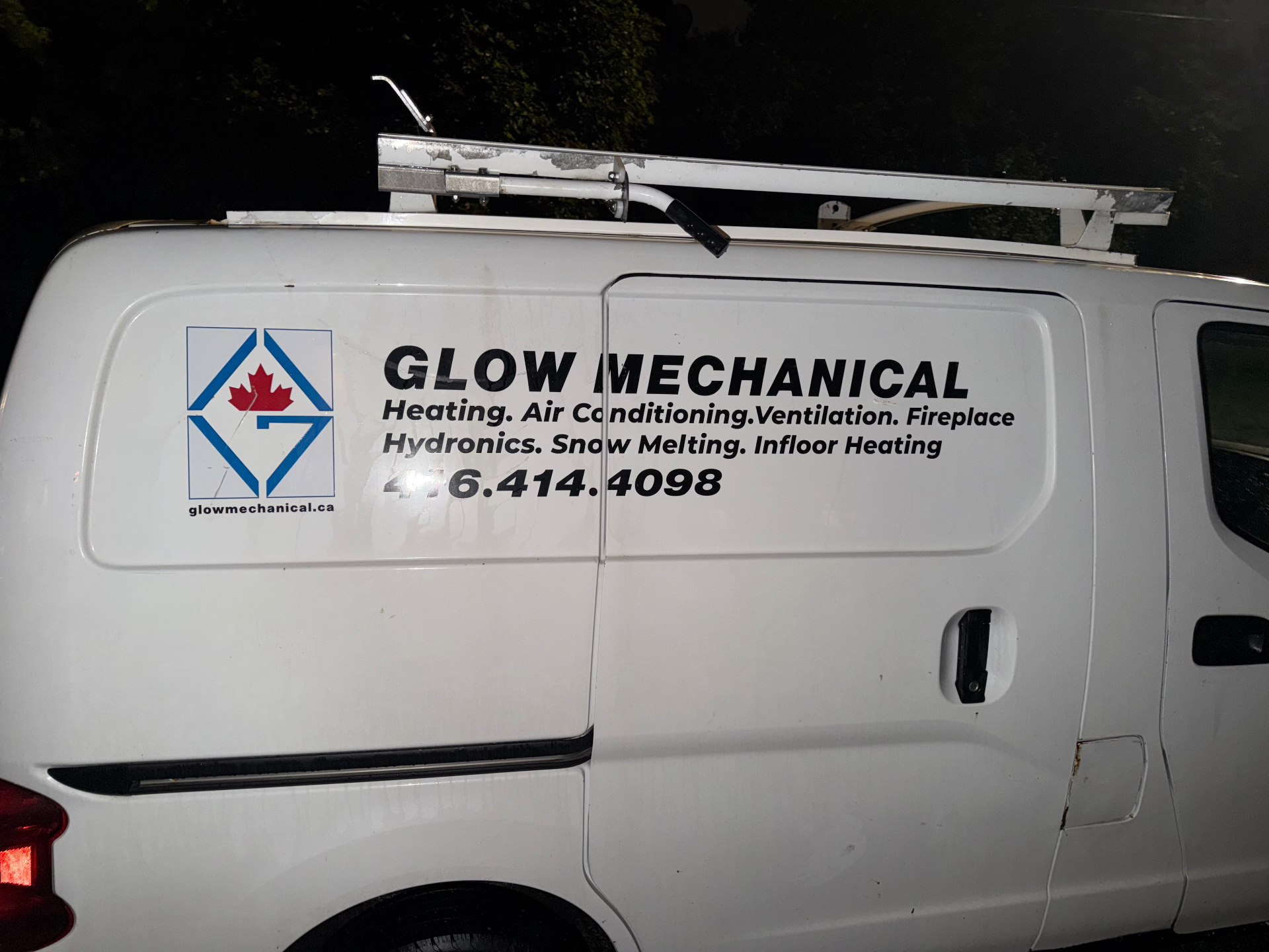 Glow Mechanical service van with company logo and phone number